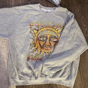 Oversized, comfy 90s style grey sublime sweater
